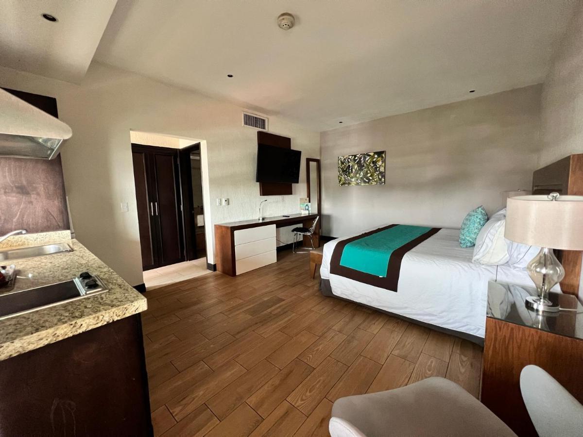 Aurea Hotel And Suites Сапопан Экстерьер фото