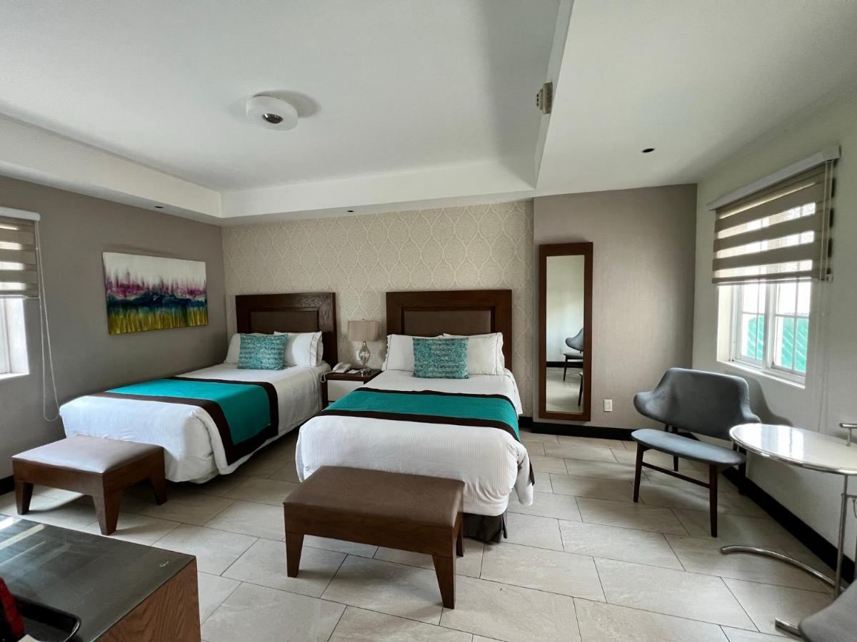 Aurea Hotel And Suites Сапопан Экстерьер фото