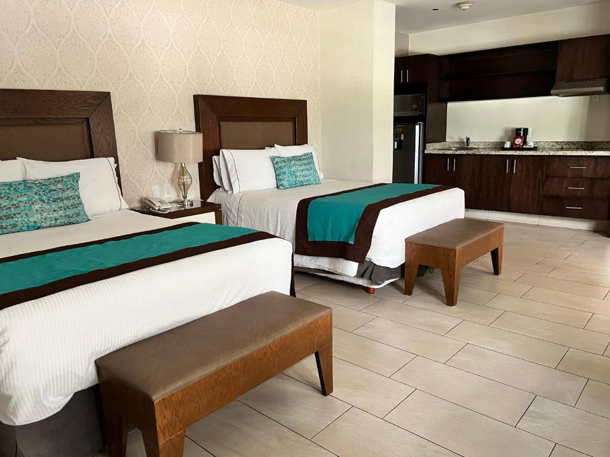 Aurea Hotel And Suites Сапопан Экстерьер фото