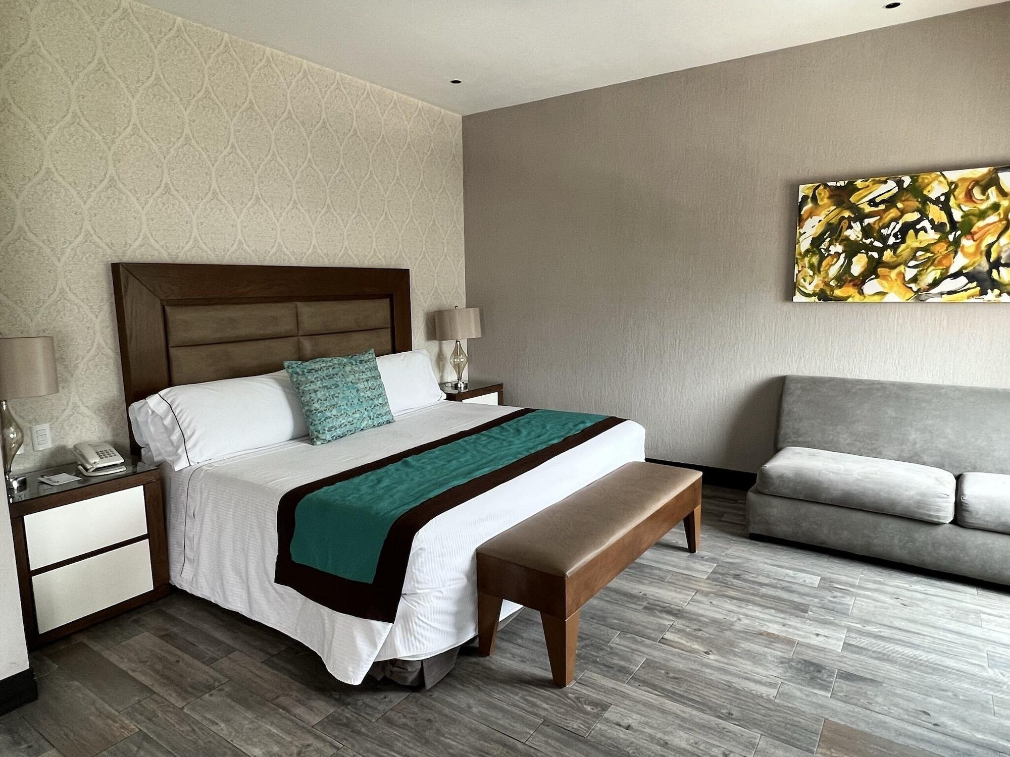Aurea Hotel And Suites Сапопан Экстерьер фото